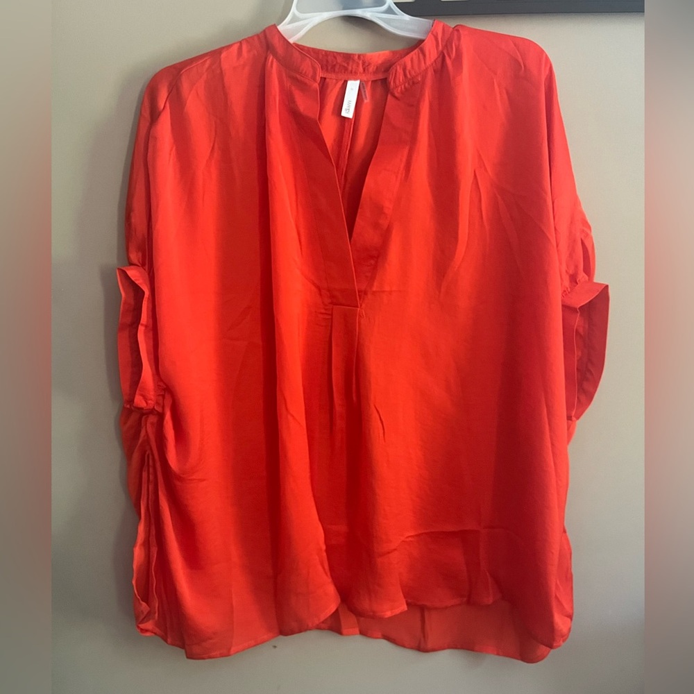 Orange silky shirt